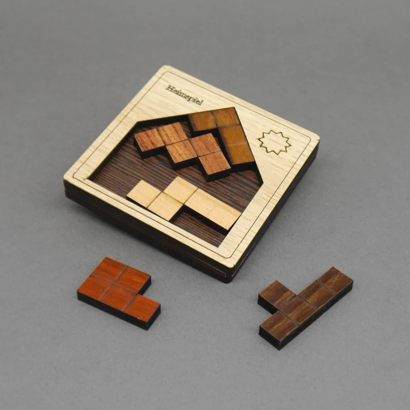 HEIMSPIEL - kleines, schwieriges Holzpuzzle