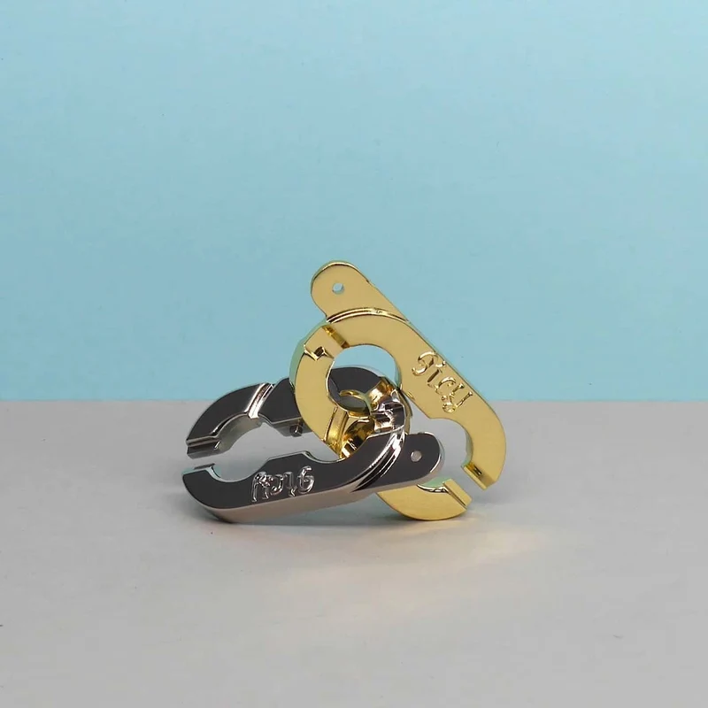 HUZZLE CAST KEYRING - elegantes Denkspiel