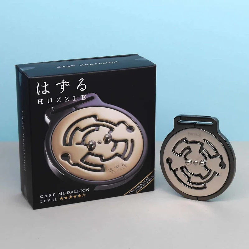 HUZZLE CAST MEDALLION - tolles Drehpuzzle