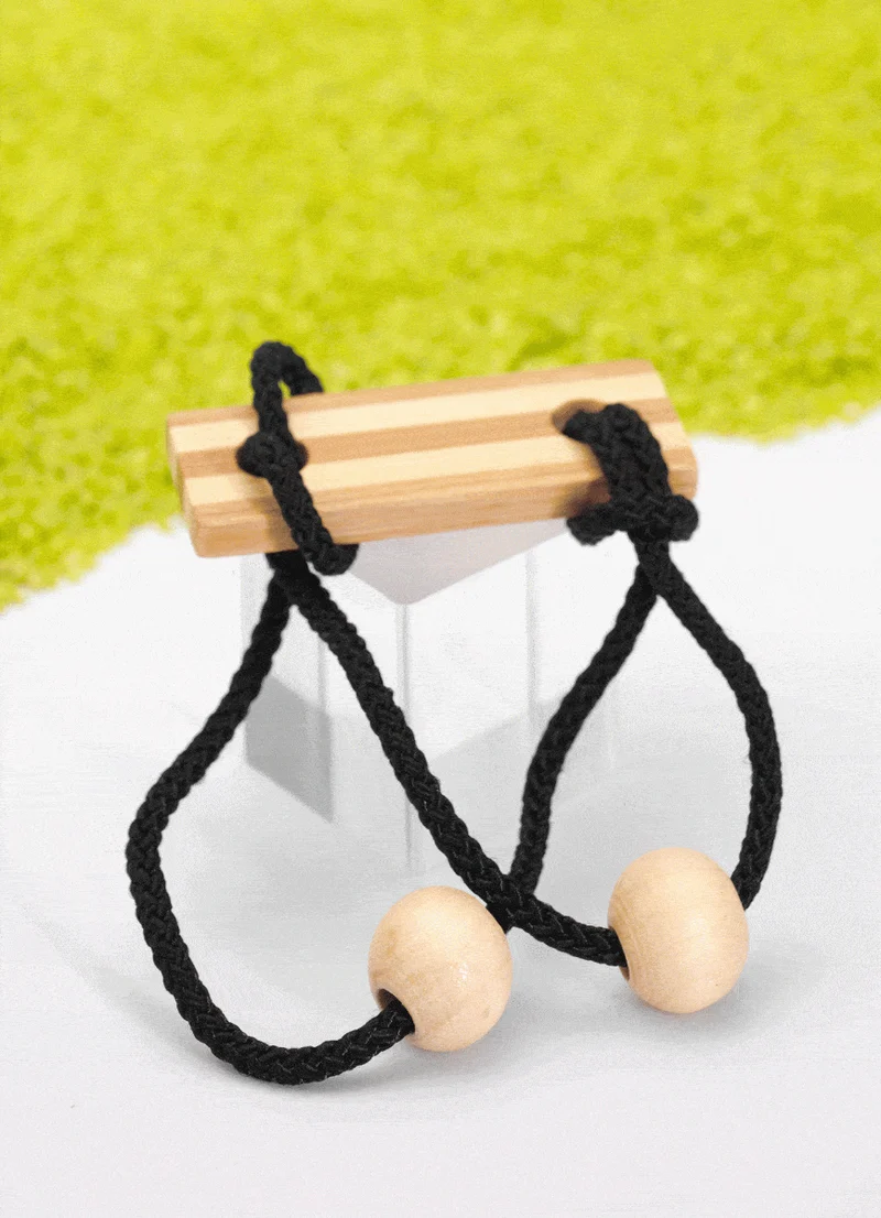 Geschicklichkeitsspiel - IQ-Test in der Dose: Bambus Schnurr-Puzzle Schwarz
