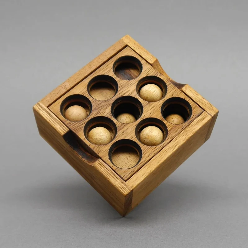 9 LOCH PUZZLE - mittelschweres Holzpuzzle