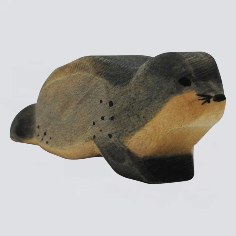 Holzwald Holzfigur Seehund liegend